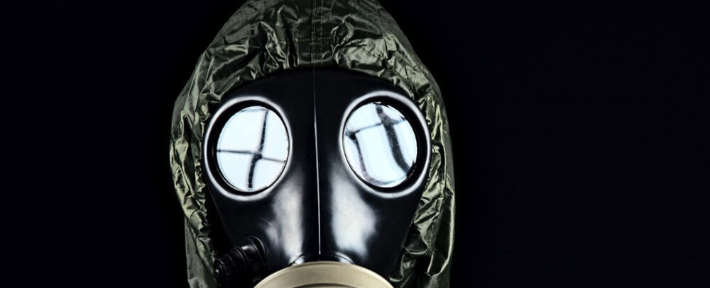 Man in Gas Mask with black background