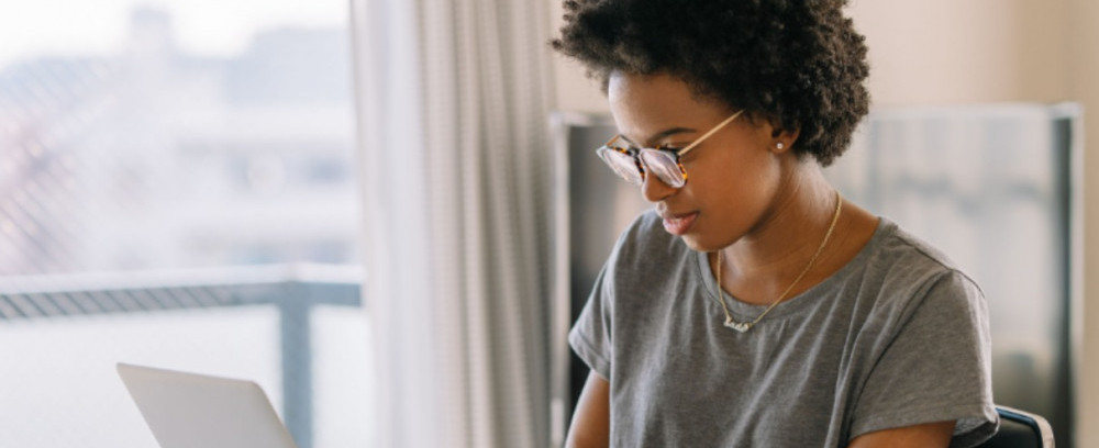 Young black woman on laptop