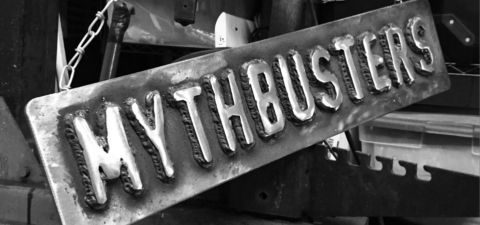 Mythbusters word on metal block